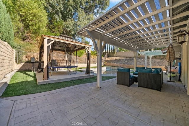 view of patio / terrace featuring an outdoor hangout area, a pergola, and a trampoline