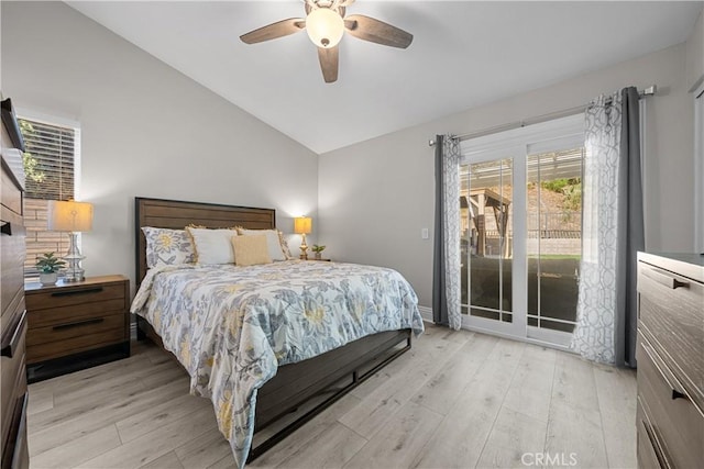 bedroom with light wood-type flooring, ceiling fan, access to exterior, and lofted ceiling