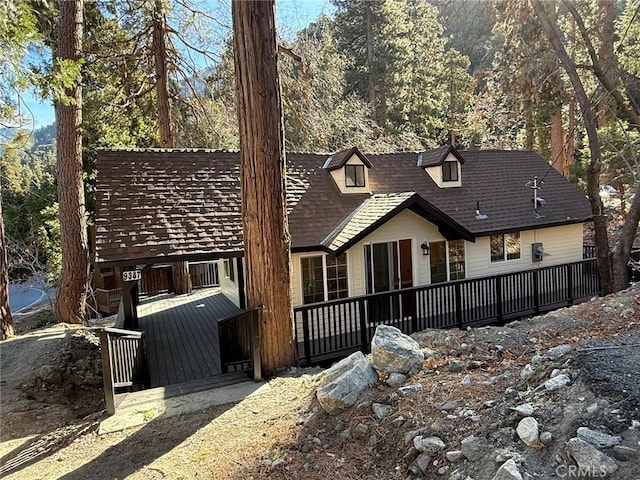 view of front of house with a wooden deck