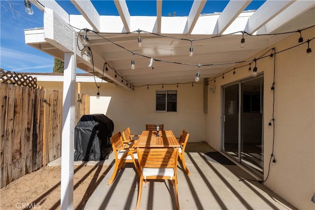 58387 Carlyle Dr, Yucca Valley, CA 92284 - view of patio with outdoor dining area and fence