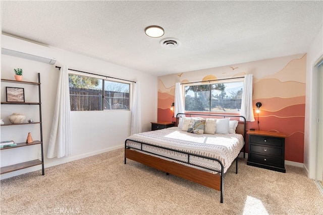 58387 Carlyle Dr, Yucca Valley, CA 92284 - bedroom featuring a textured ceiling, visible vents, baseboards, and carpet