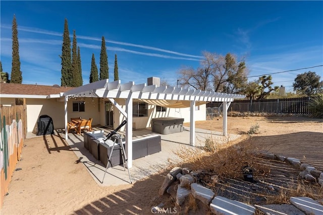 rear view of house featuring an outdoor hangout area, a pergola, a patio area, and a hot tub