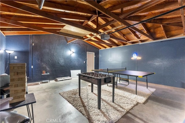 rec room featuring lofted ceiling with beams, concrete floors, and wooden ceiling