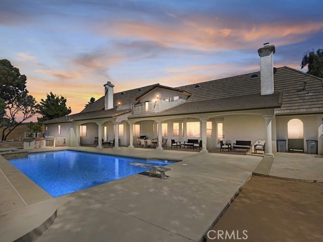 outdoor pool featuring a patio area