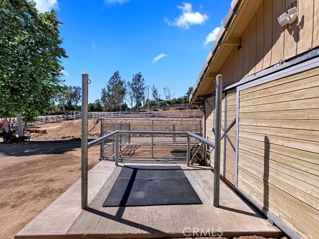 view of patio / terrace featuring fence