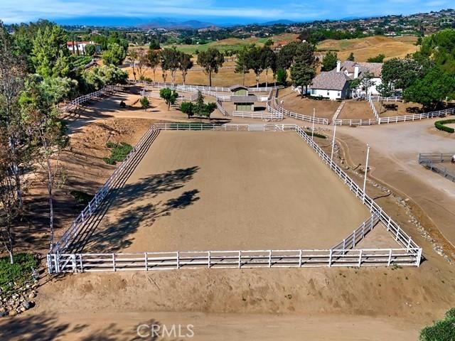 birds eye view of property featuring a rural view