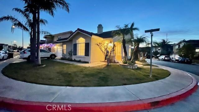 view of front of property with a front lawn