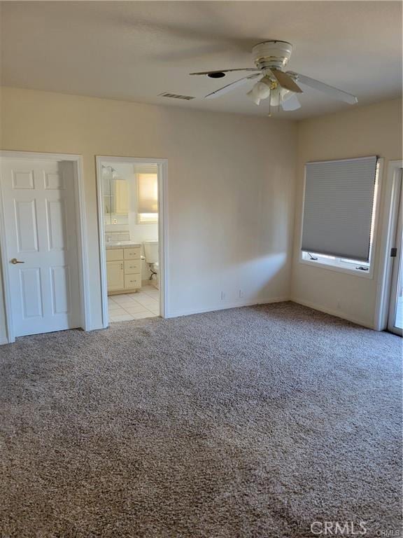 6966 Ranch View Rd, Riverside, CA 92506 - unfurnished bedroom featuring light carpet, ensuite bathroom, and ceiling fan