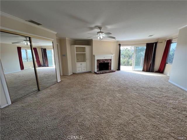 6966 Ranch View Rd, Riverside, CA 92506 - unfurnished living room featuring a ceiling fan, crown molding, carpet flooring, a fireplace, and plenty of natural light