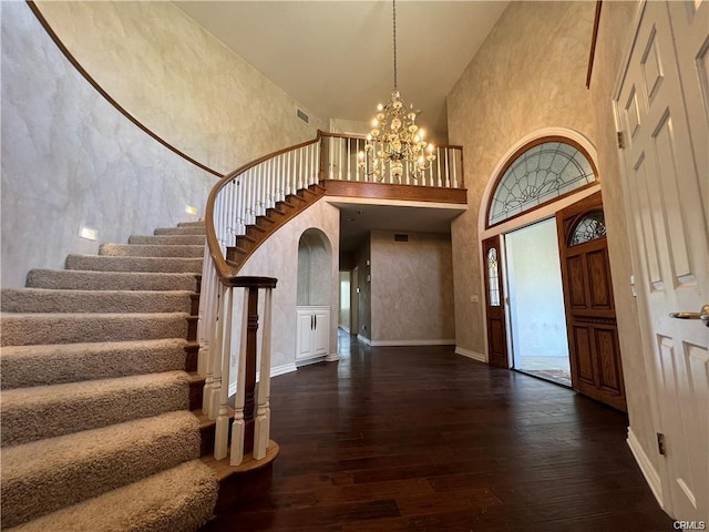 6966 Ranch View Rd, Riverside, CA 92506 - foyer entrance with high vaulted ceiling, stairway, hardwood / wood-style floors, and a chandelier