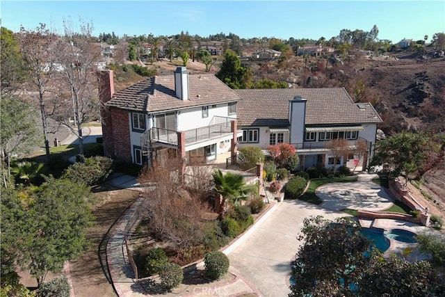 6966 Ranch View Rd, Riverside, CA 92506 - rear view of house featuring a chimney and a balcony