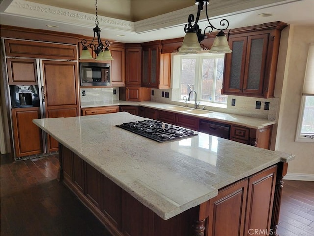 6966 Ranch View Rd, Riverside, CA 92506 - kitchen featuring built in appliances, healthy amount of natural light, dark wood-style floors, a kitchen island, and recessed lighting