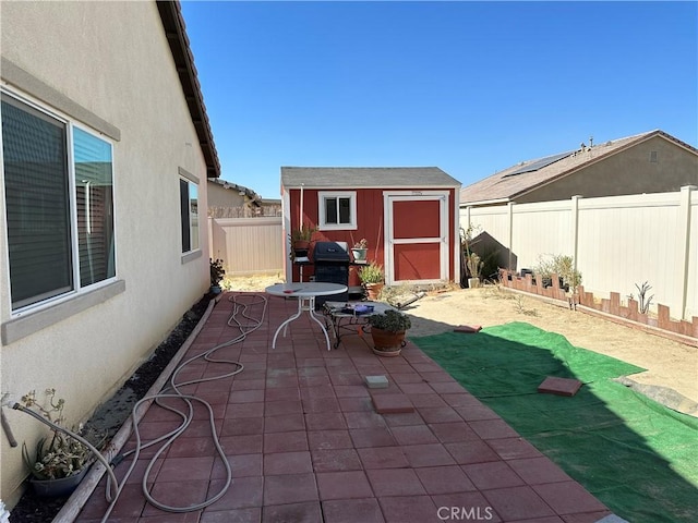 view of patio / terrace with a storage unit