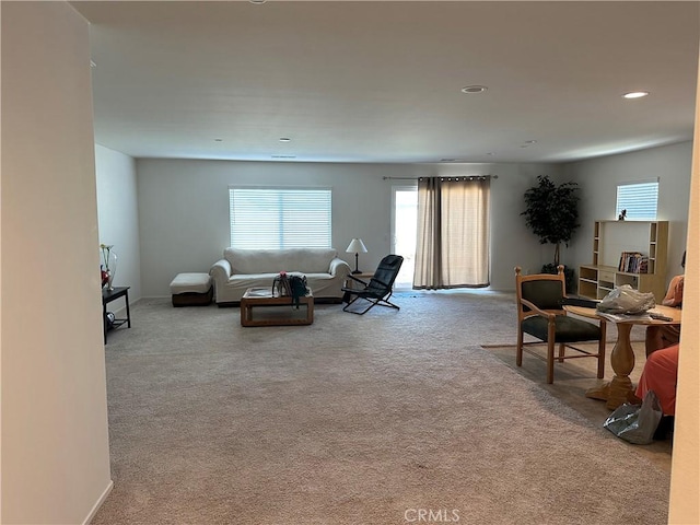 living room featuring light colored carpet