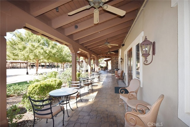 view of patio / terrace featuring ceiling fan