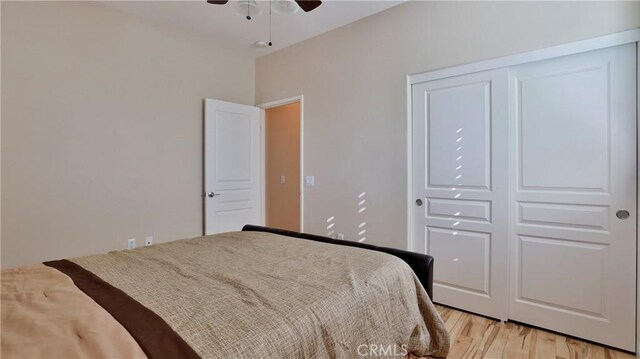 bedroom featuring ceiling fan and light hardwood / wood-style flooring