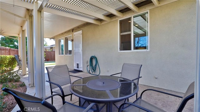 view of patio featuring a pergola