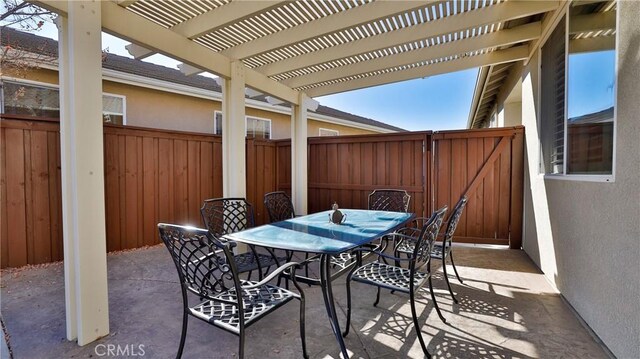 view of patio featuring a pergola