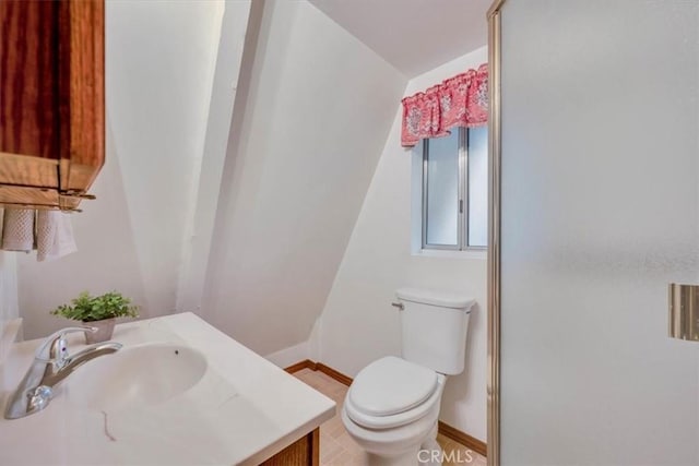 bathroom featuring sink and toilet