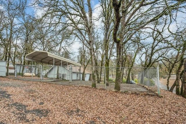 view of yard with a carport