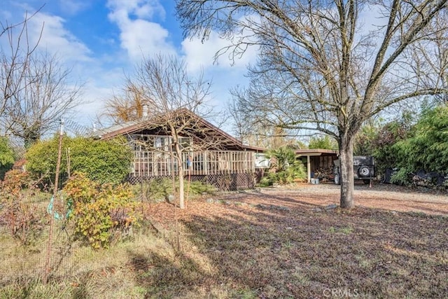 view of yard featuring a wooden deck