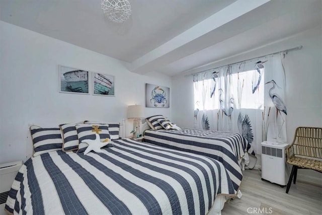 bedroom with light hardwood / wood-style floors