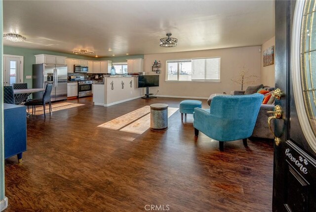 living room featuring dark hardwood / wood-style floors