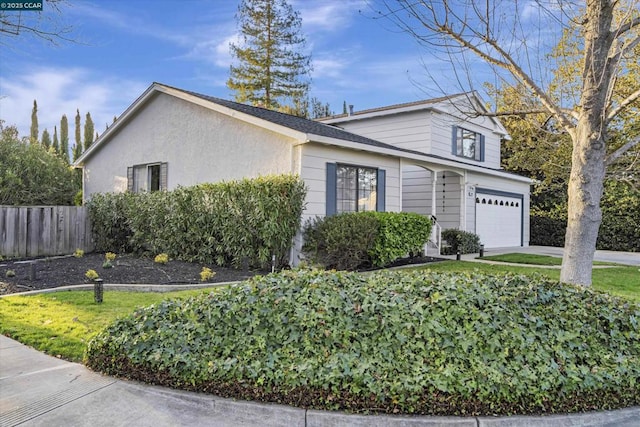 view of front of home with a garage