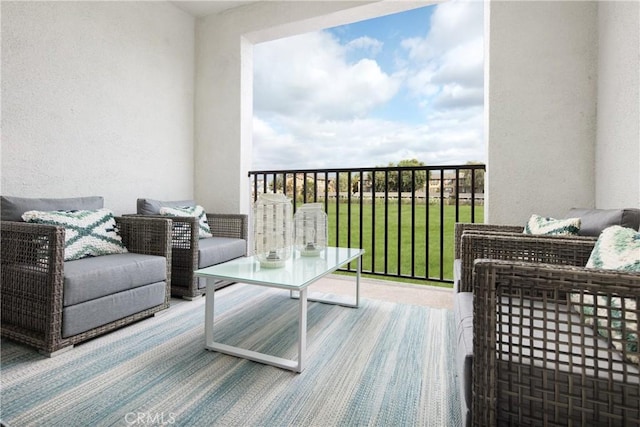 balcony with an outdoor hangout area