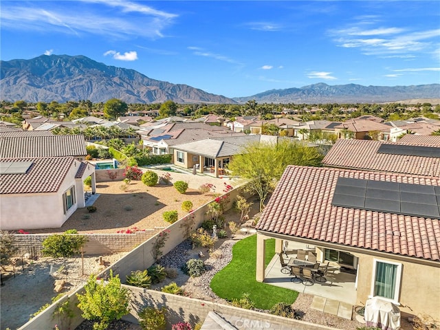 bird's eye view with a mountain view