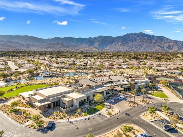 birds eye view of property featuring a mountain view