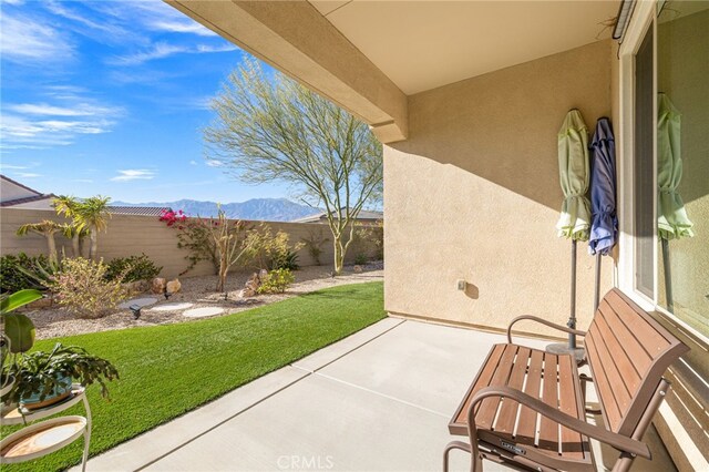 view of patio with a mountain view