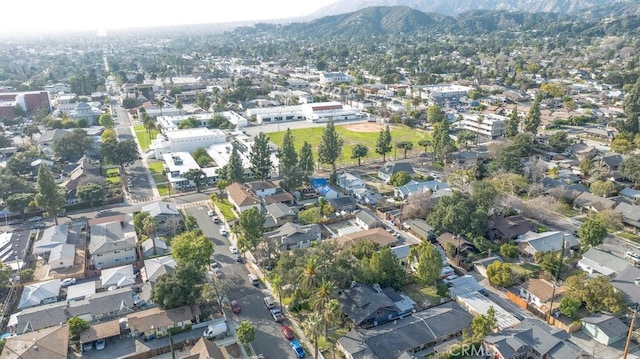 aerial view featuring a residential view and a mountain view