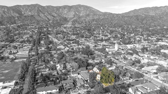 birds eye view of property featuring a residential view and a mountain view