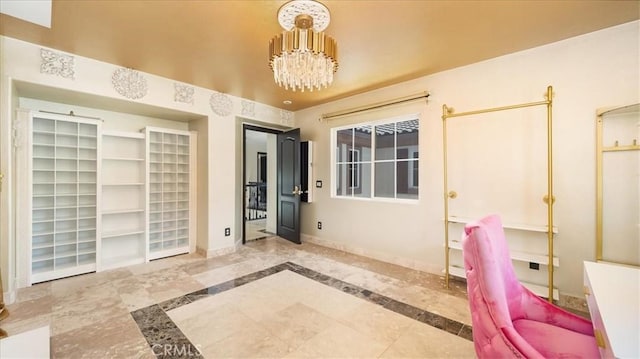 interior space with a notable chandelier