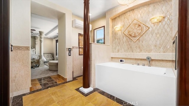 bathroom with a bathing tub, a wall mounted AC, and tile walls