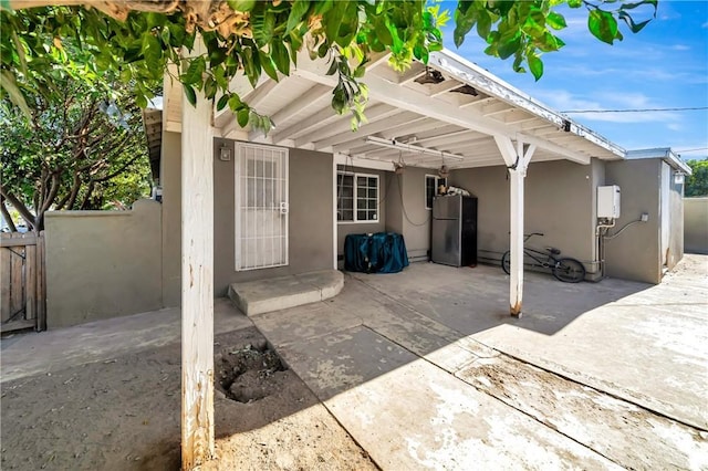 back of house with a patio area