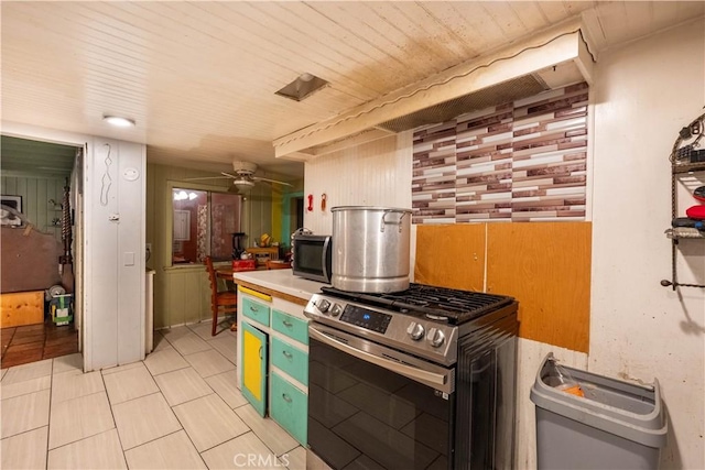 kitchen featuring ceiling fan and stainless steel appliances