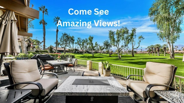 view of patio / terrace featuring a fire pit