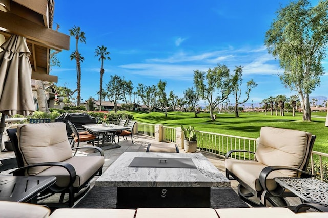 view of patio / terrace with an outdoor fire pit