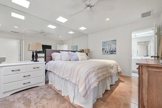 bedroom with ceiling fan and light tile patterned floors