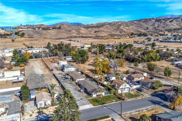 birds eye view of property featuring a mountain view