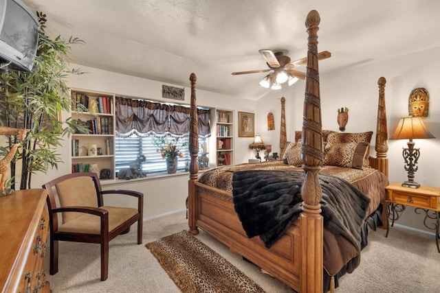 bedroom featuring ceiling fan and light carpet