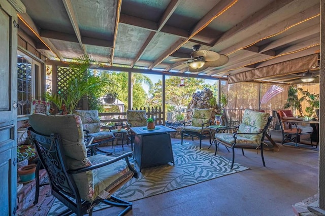 sunroom / solarium with ceiling fan