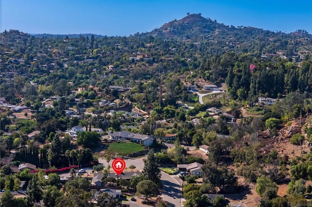 drone / aerial view featuring a mountain view