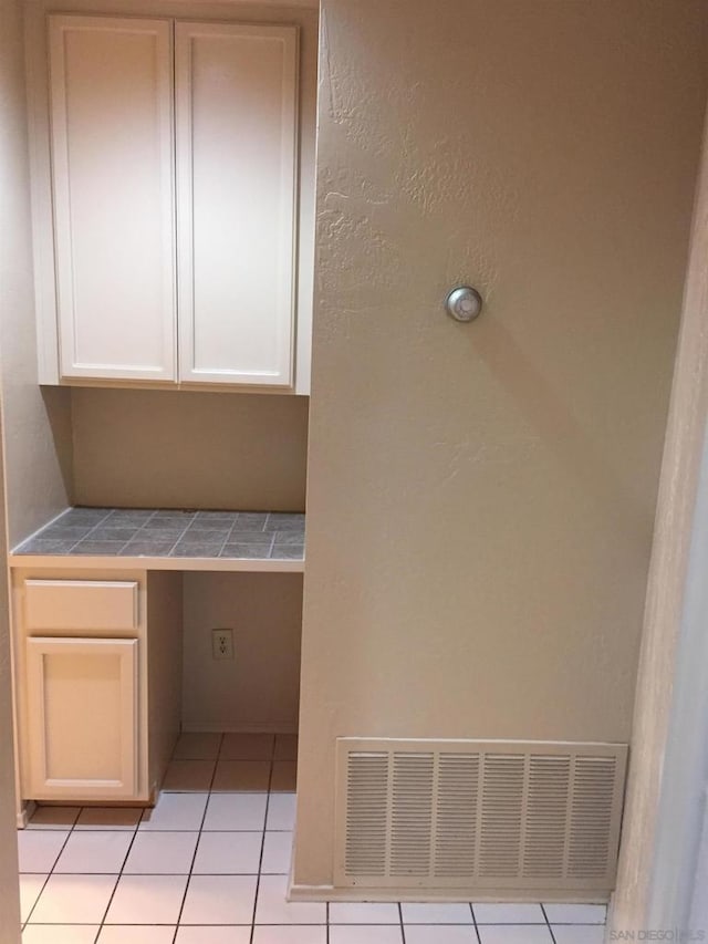 washroom featuring light tile patterned floors