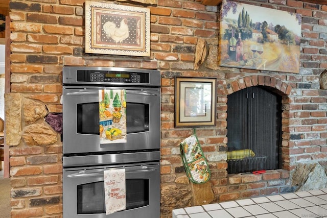 kitchen with tile countertops and double oven