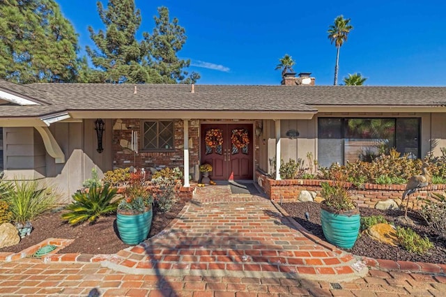 property entrance with french doors