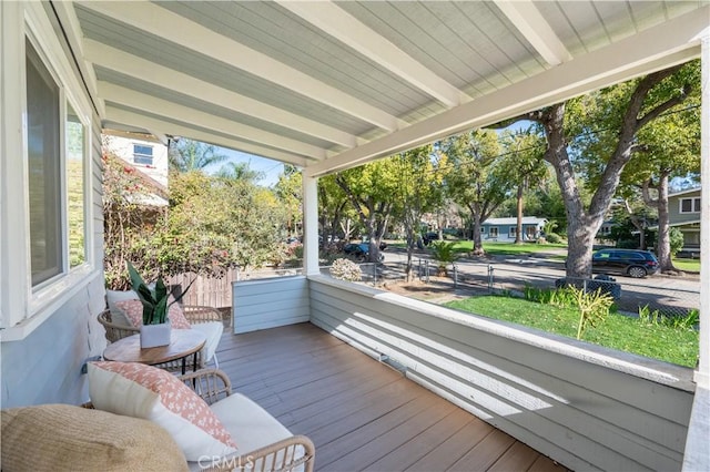 wooden terrace featuring a porch