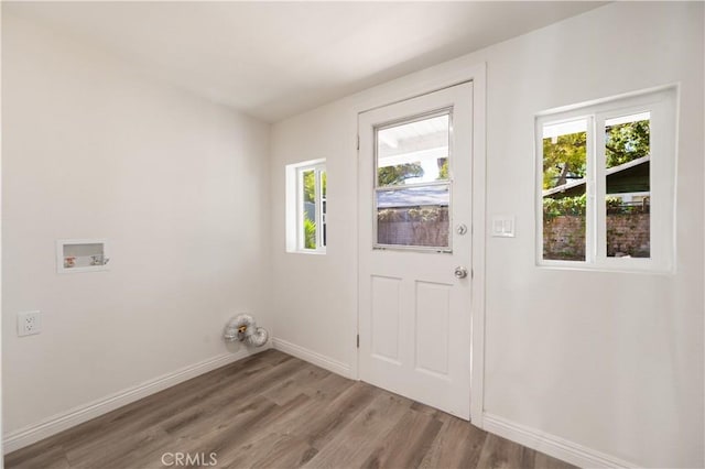 doorway to outside with light hardwood / wood-style flooring